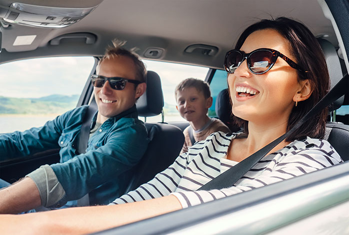 Family driving in a car