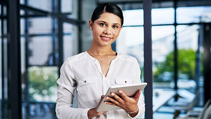 woman on iPad completing form