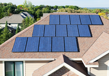 House will solar panels installed on roof.