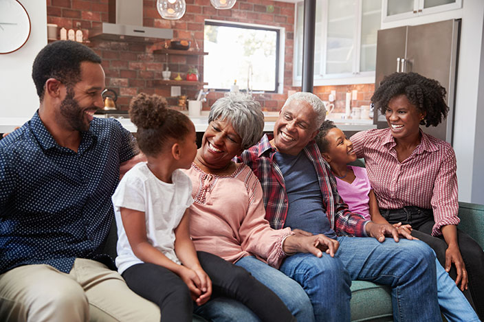 Family members sitting together on a couch