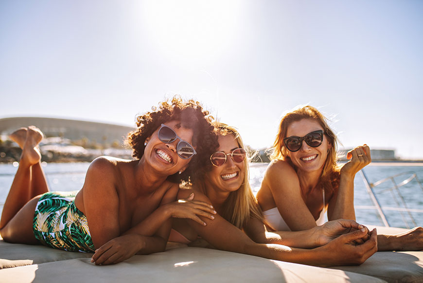 Three women enjoying the sun