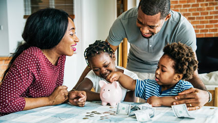Family using piggy bank