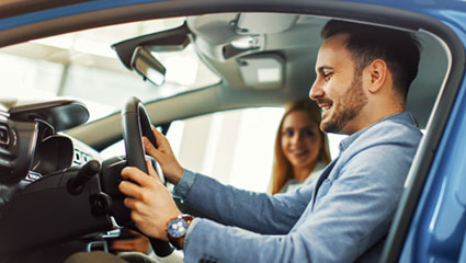 Man behind the wheel of car