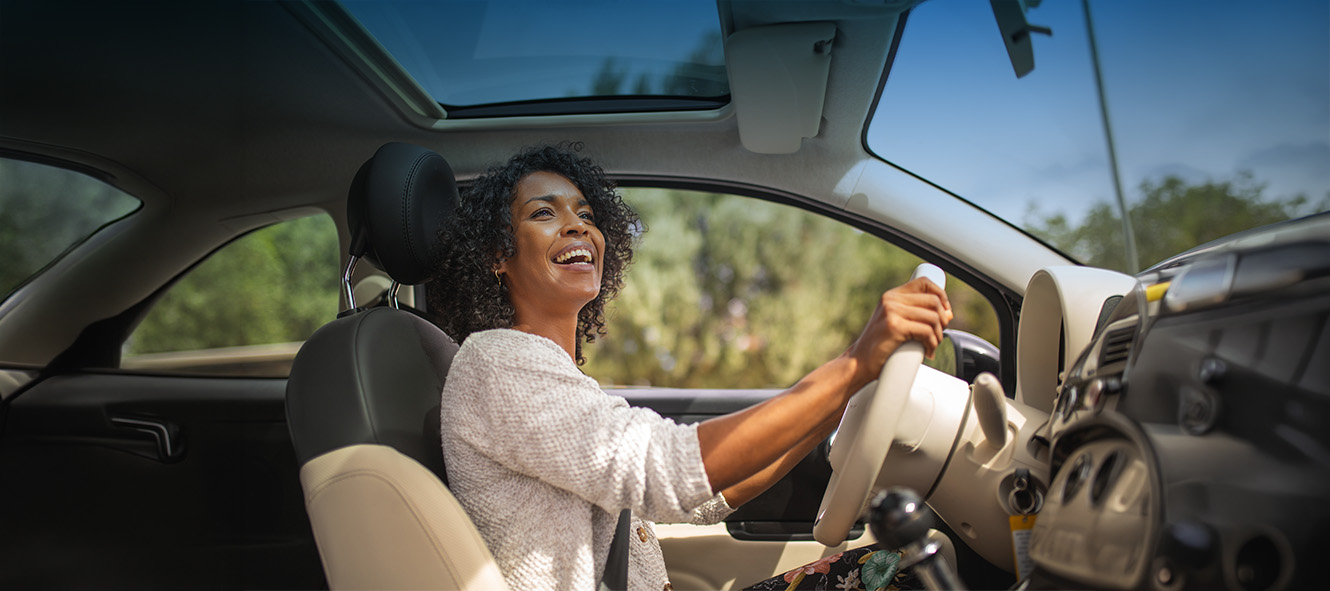 African American woman driving in car