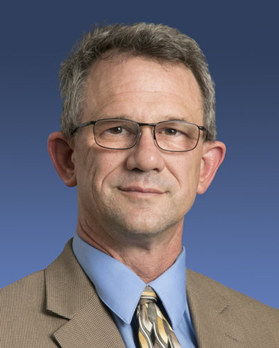 Portrait of Phil Neufeld